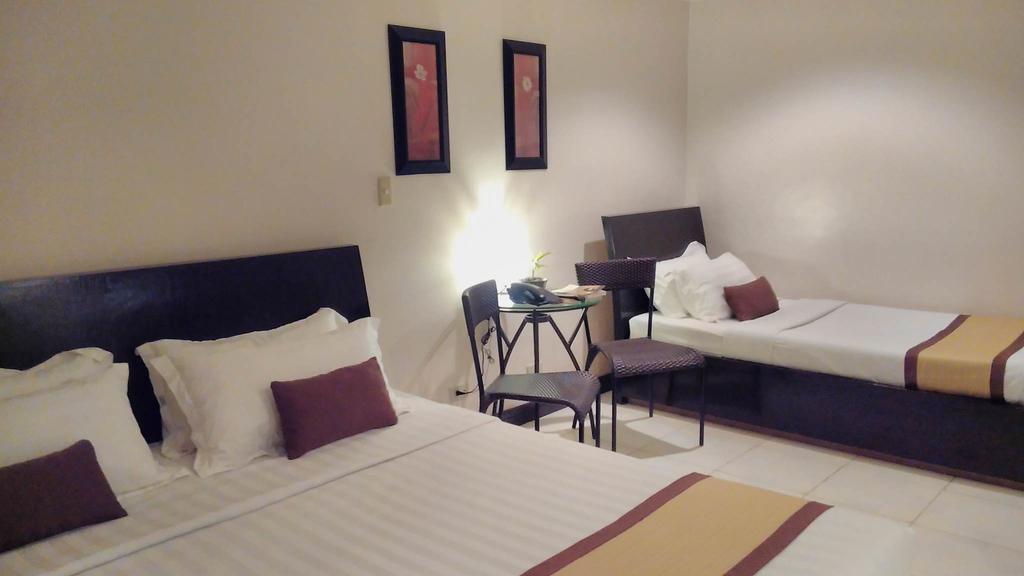 Hotel Tavern Суригао Екстериор снимка